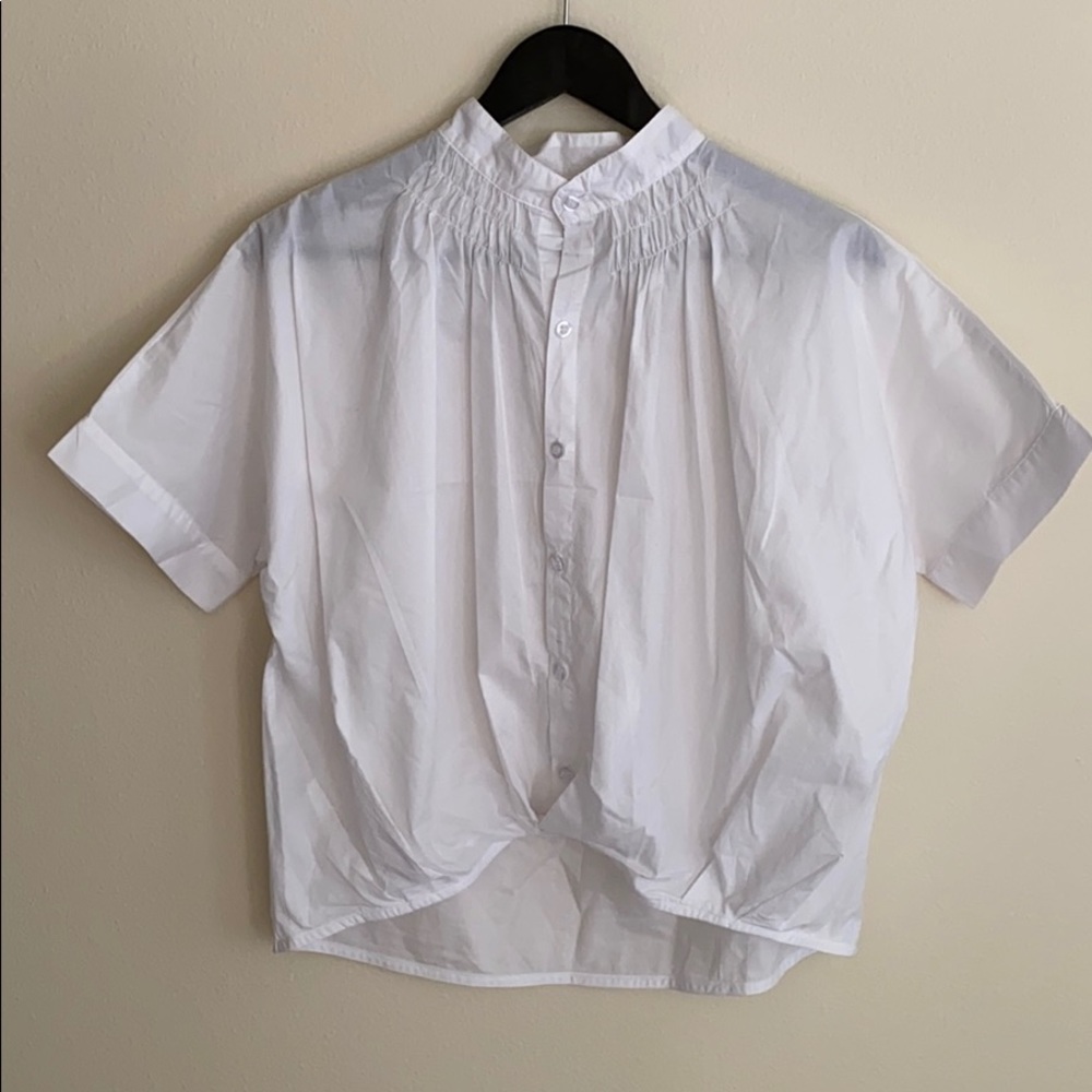 Main Strip white button down